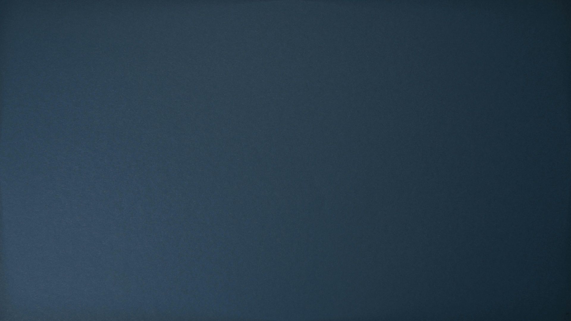 Dark blue gradient background with a slightly lighter horizontal band near the bottom.